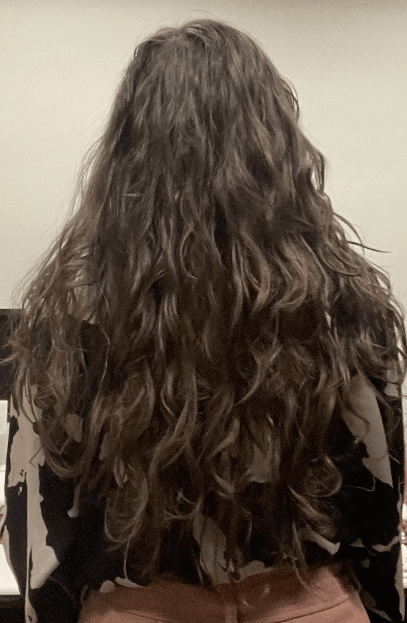 Naturally Wavy Mid-Back Hair — Low Maintenance Winter Haircuts