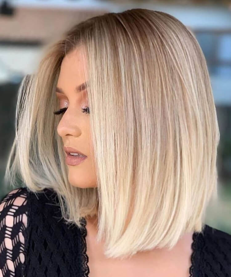 The Sleek Blunt Chin Bob — Winter Hairstyles for Round Faces