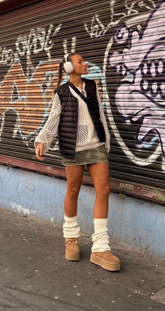 Olive Green Mini Skirt and Puffer Vest with White Leg Warmers — Leg Warmers Outfits