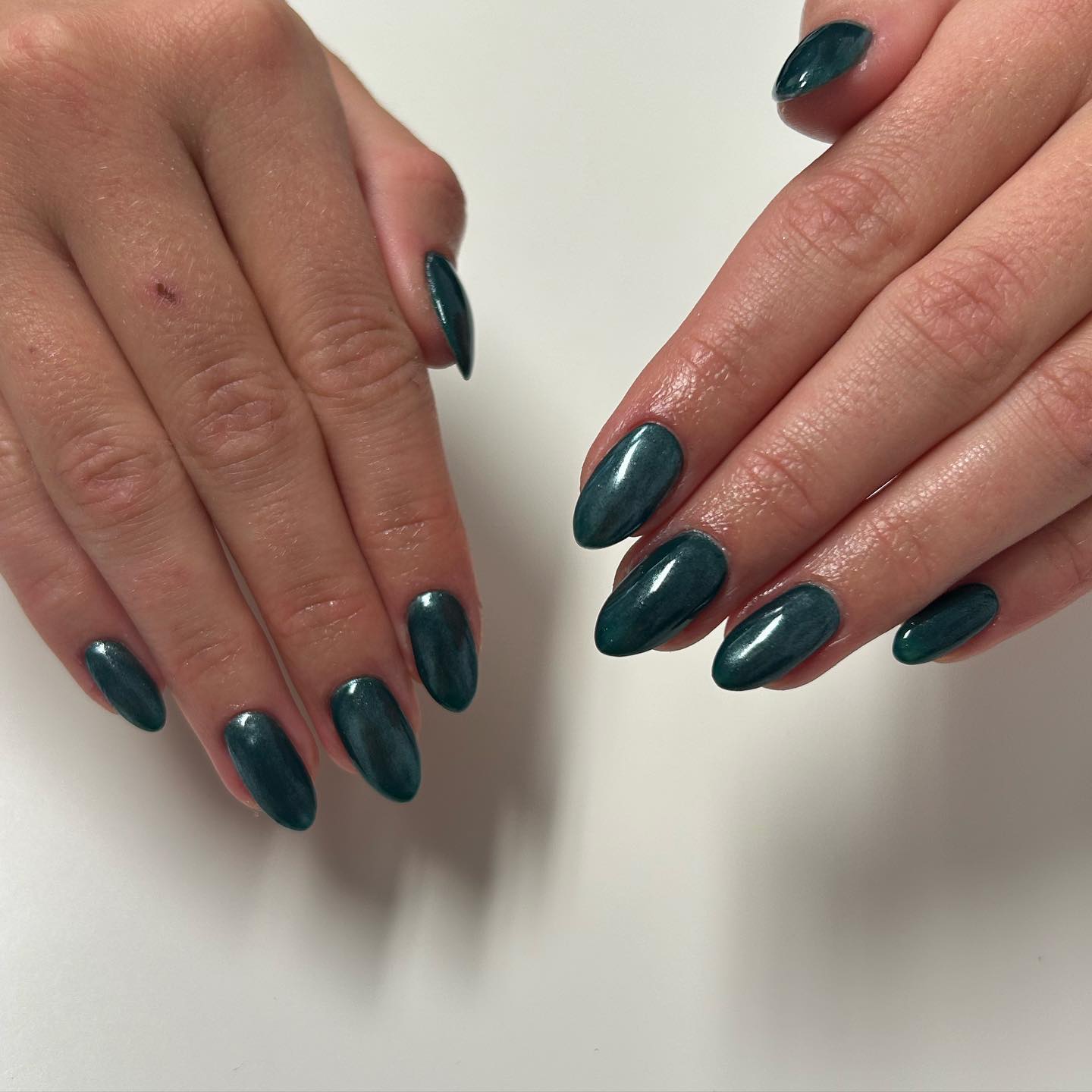 Deep Shimmering Teal Medium Almond Nails Deep Shimmering Teal Medium Almond Nails — Winter Nail Colors for Women Over 40