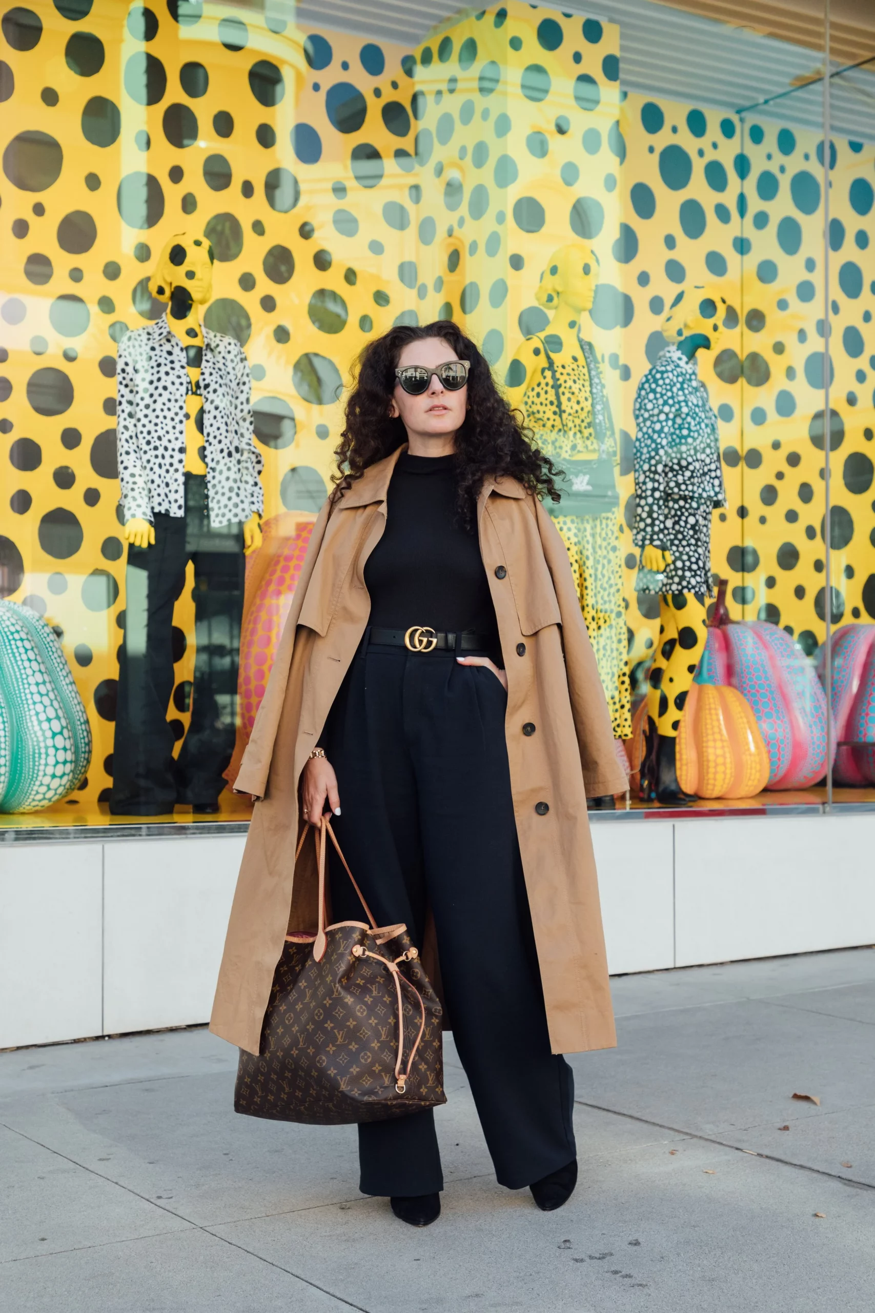 City Chic: Camel Trench Coat Draped Over Black Turtleneck and Trousers — Camel Coat Outfits