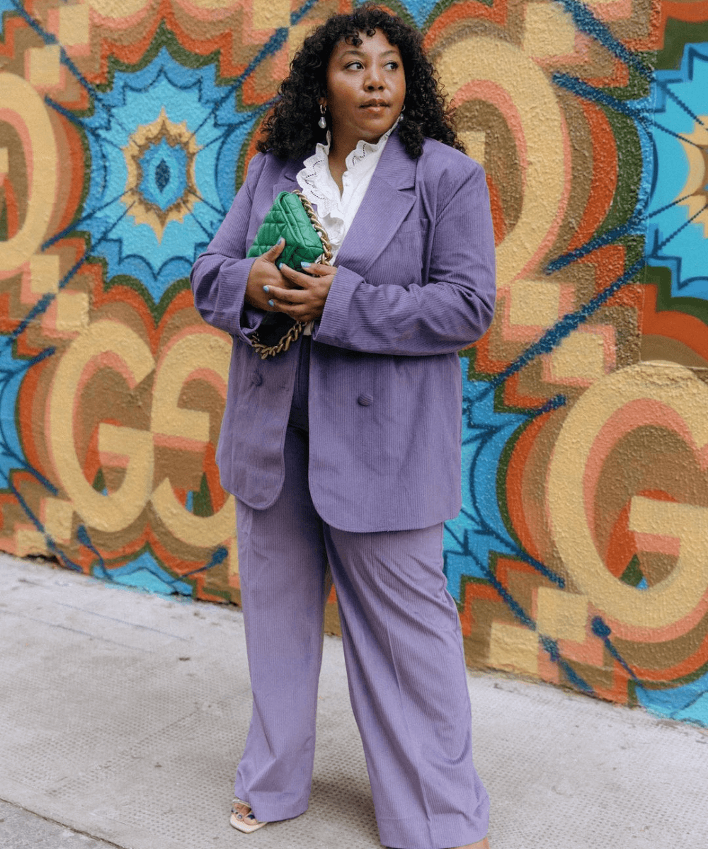 Tailored Pinstripe Suit with a Ruffled Blouse for a Modern Wedding Guest — Winter Wedding Guest Outfits