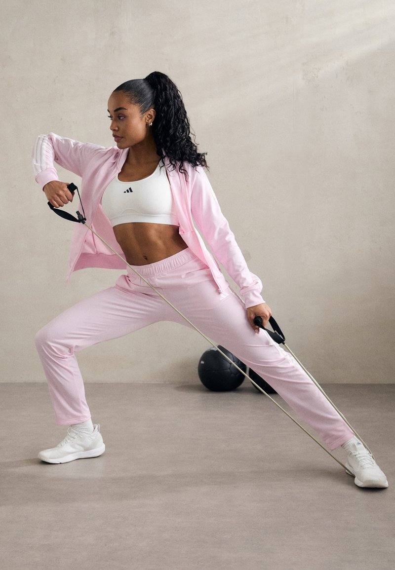 Vibrant Pink Tracksuit for an Energetic Workout — Winter Workout Outfits