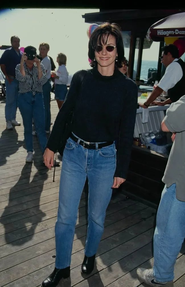High-Waisted Straight Leg Jeans With Knit Sweater — 90s Party Outfit Inspiration