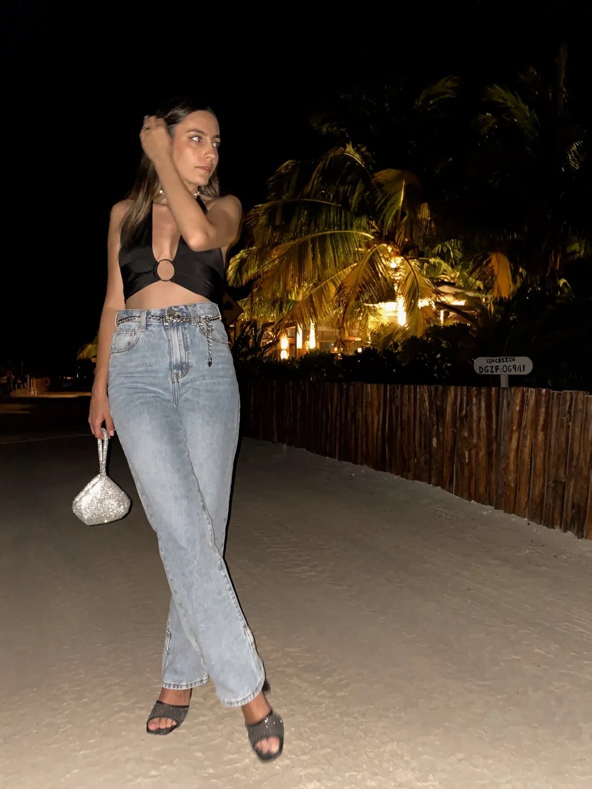 Halter Crop Top With Flared Split-Hem Jeans — 90s Party Outfit Inspiration