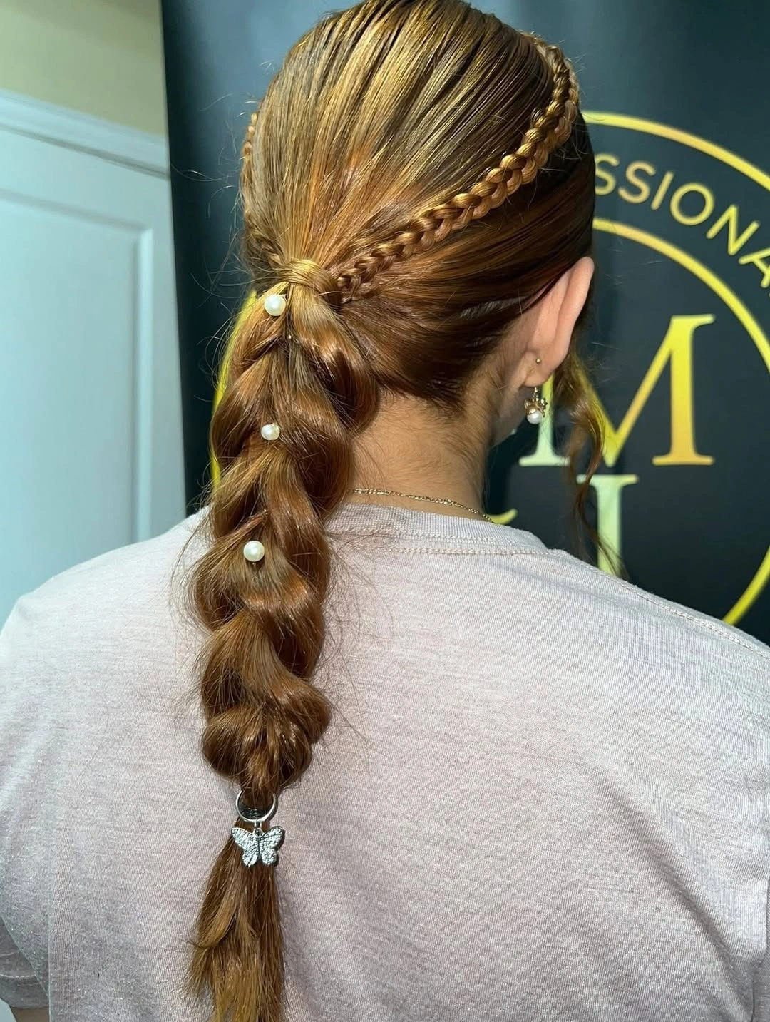 Smooth gathered ponytail with side braid, white accents and butterfly clip