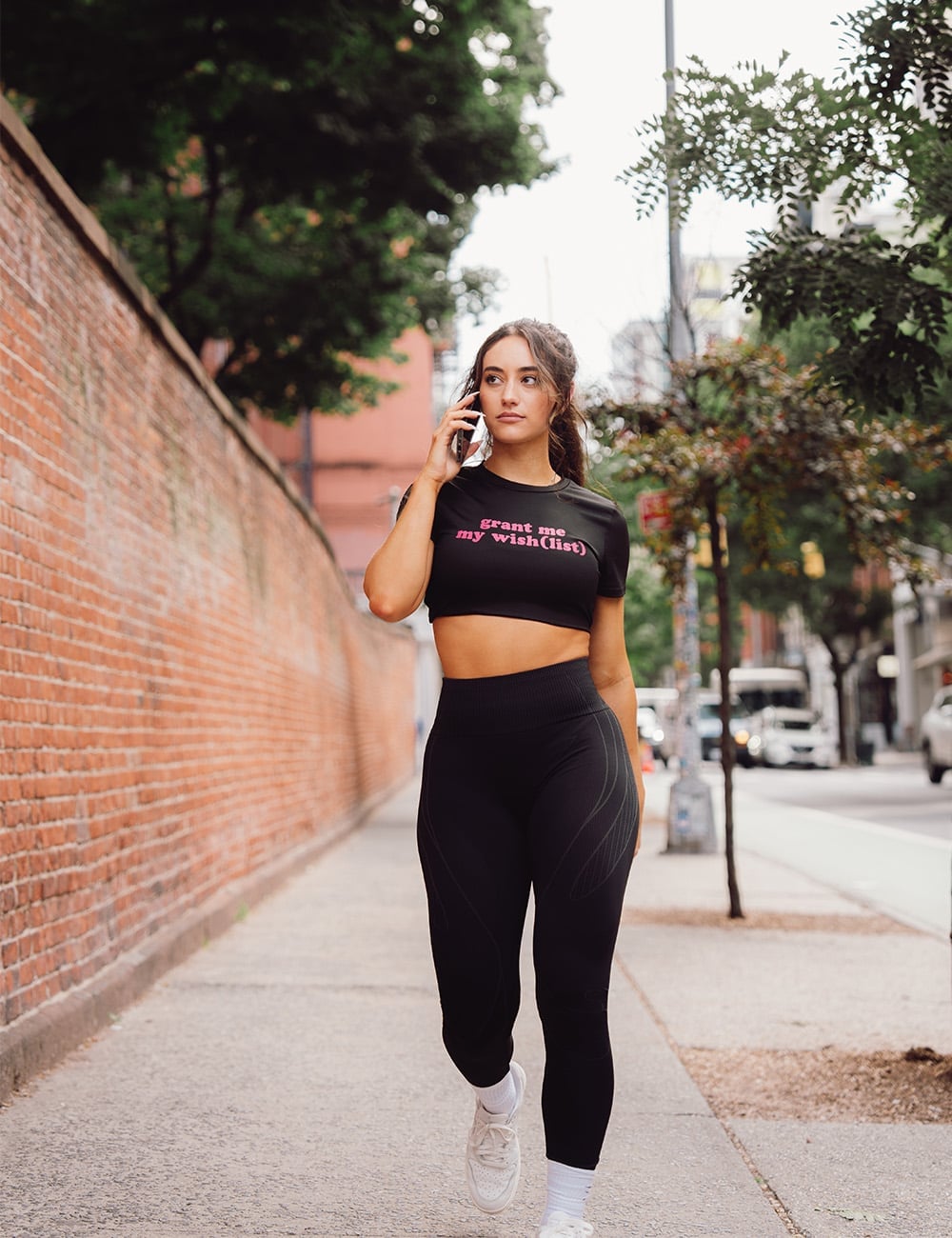 Graphic T-Shirt and Black Leggings for a Casual Look Graphic T-Shirt and Black Leggings for a Casual Look — Aesthetic Black Leggings Outfit