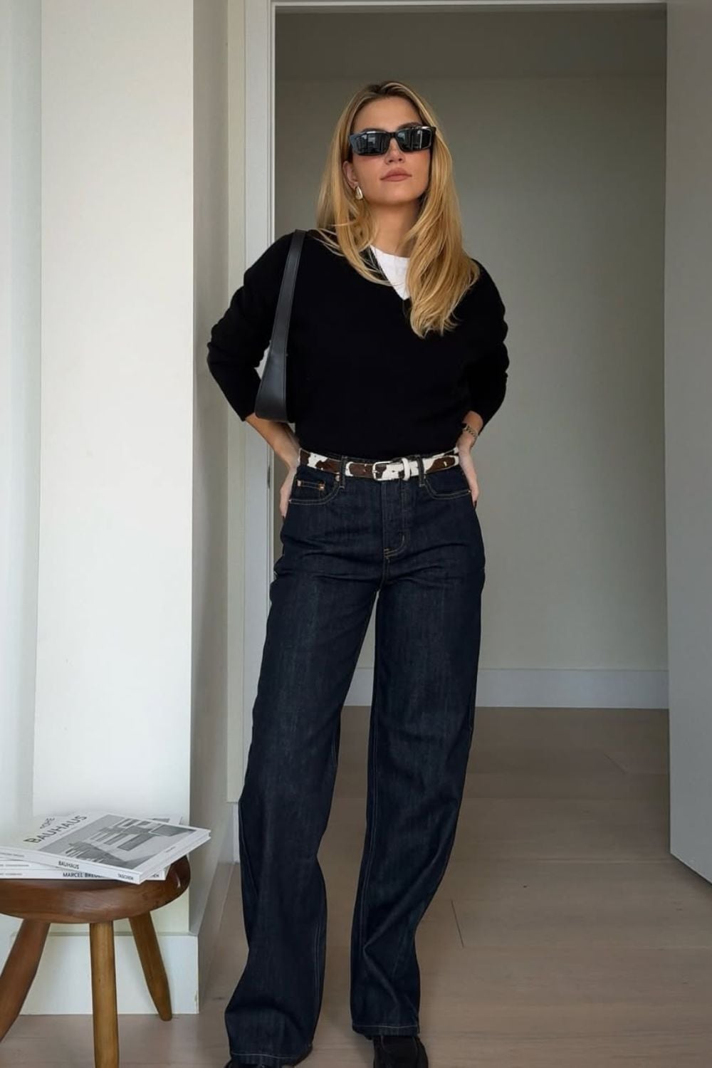 V-Neck Sweater Over T-Shirt With Wide Leg Jeans — Aesthetic Black Sweater Outfit