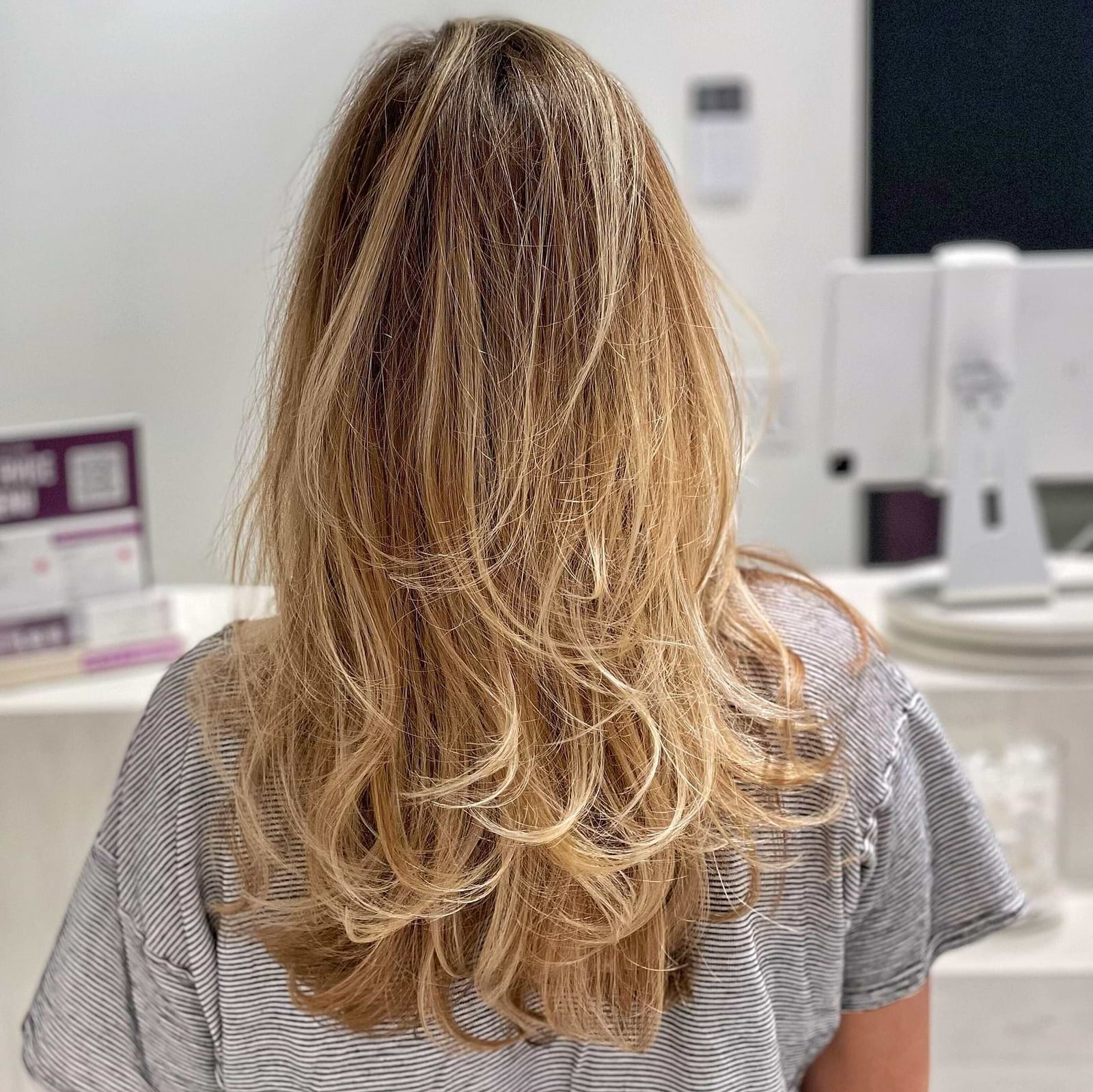 Mid-Back Layered Dark Blonde Blowout — Aesthetic Dark Blonde Hair