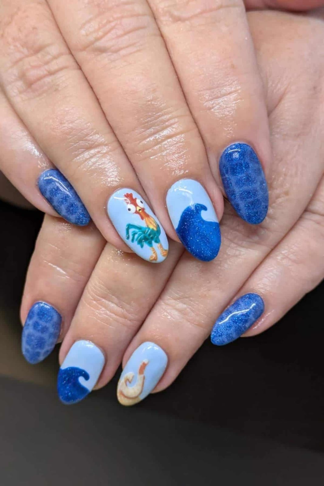 Hei Hei Ocean Wave Medium Oval Nails Hei Hei Ocean Wave Medium Oval Nails — Aesthetic Disney Nails