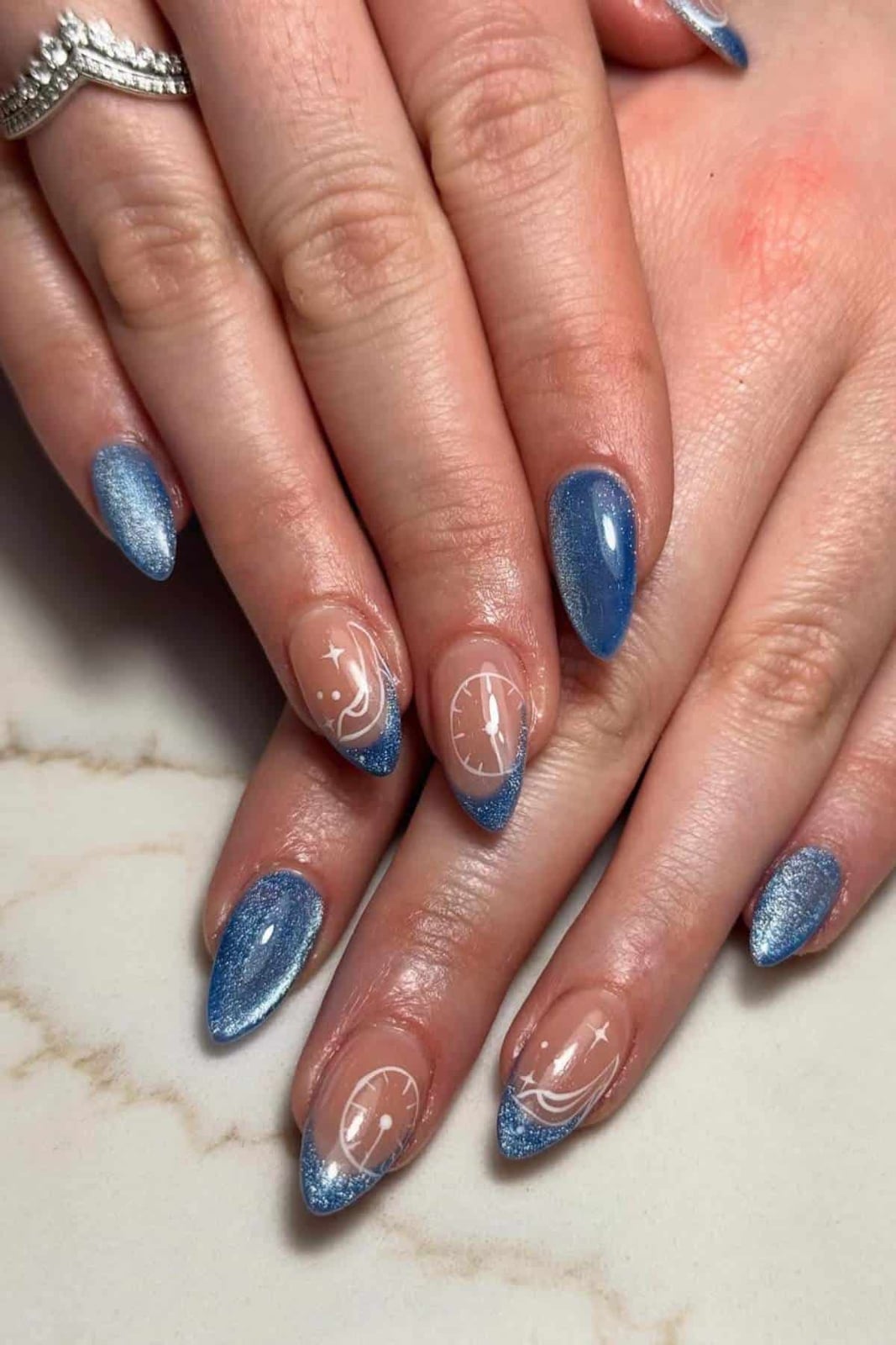 Celestial Motif Blue Shimmer Stiletto Nails Celestial Motif Blue Shimmer Stiletto Nails — Aesthetic Disney Nails