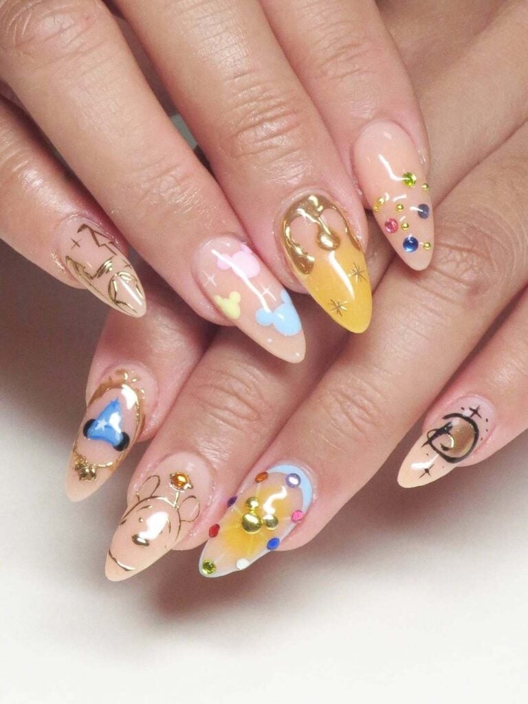 Long Stiletto Gold Elements and Bear Accents Nails Long Stiletto Gold Elements and Bear Accents Nails — Aesthetic Disney Nails