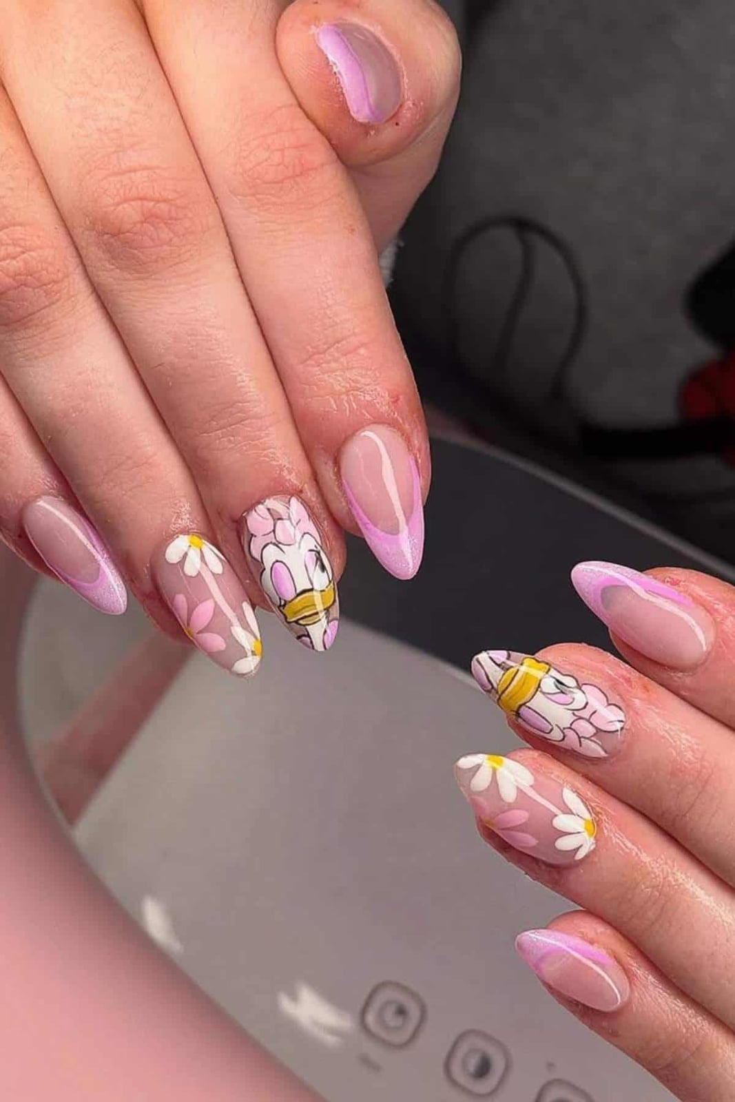 Daisy Duck and Daisy Flower Medium Almond Nails Daisy Duck and Daisy Flower Medium Almond Nails — Aesthetic Disney Nails