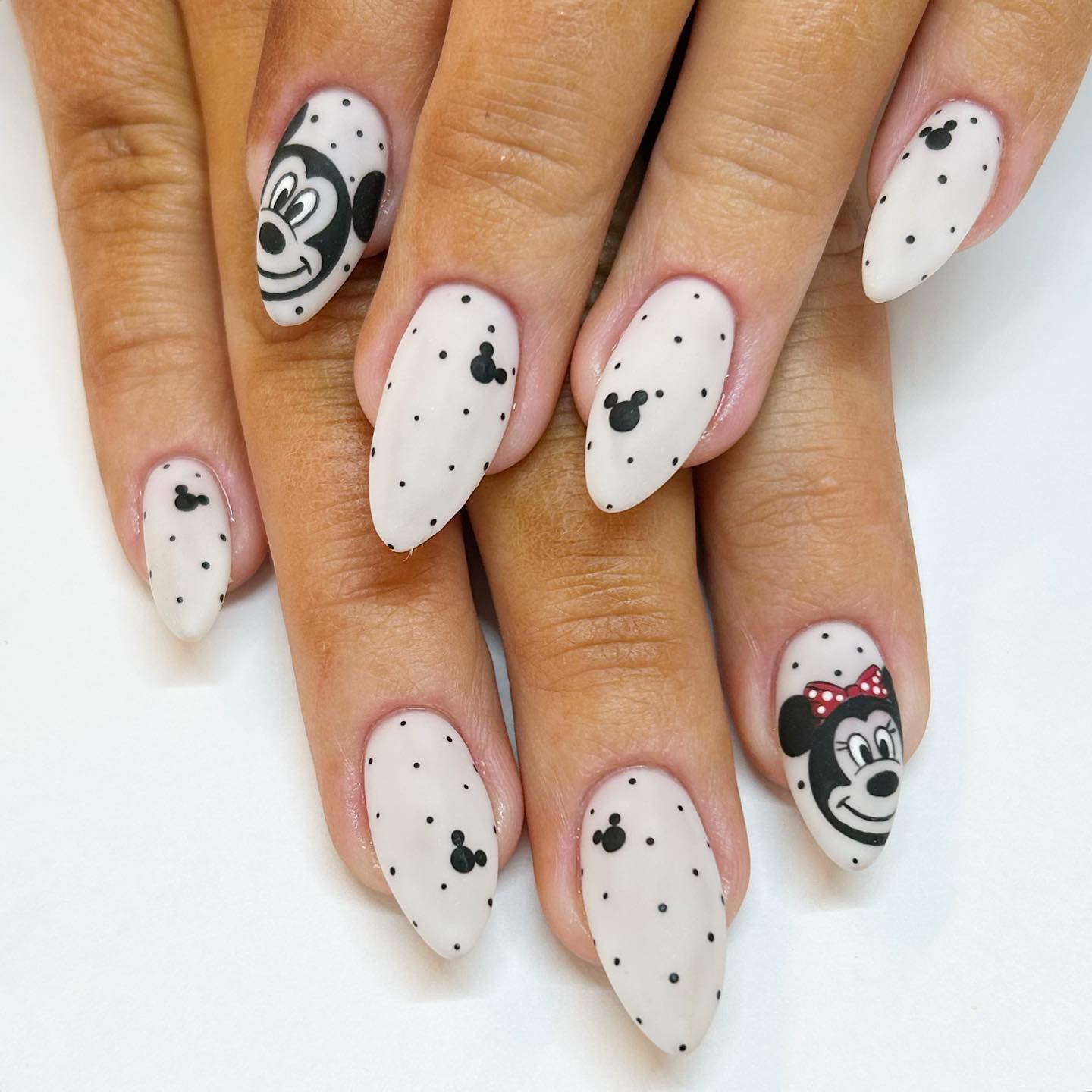 Matte White Minnie Mouse and Polka Dot Almond Nails Matte White Minnie Mouse and Polka Dot Almond Nails — Aesthetic Disney Nails
