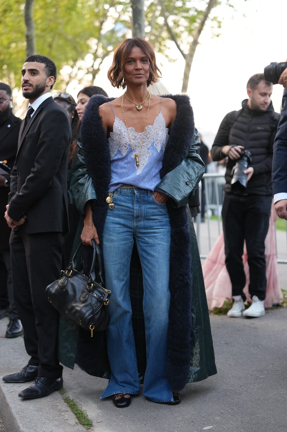 Blue Lace Camisole With Flared Jeans And Coat — Aesthetic Lace Top Outfit