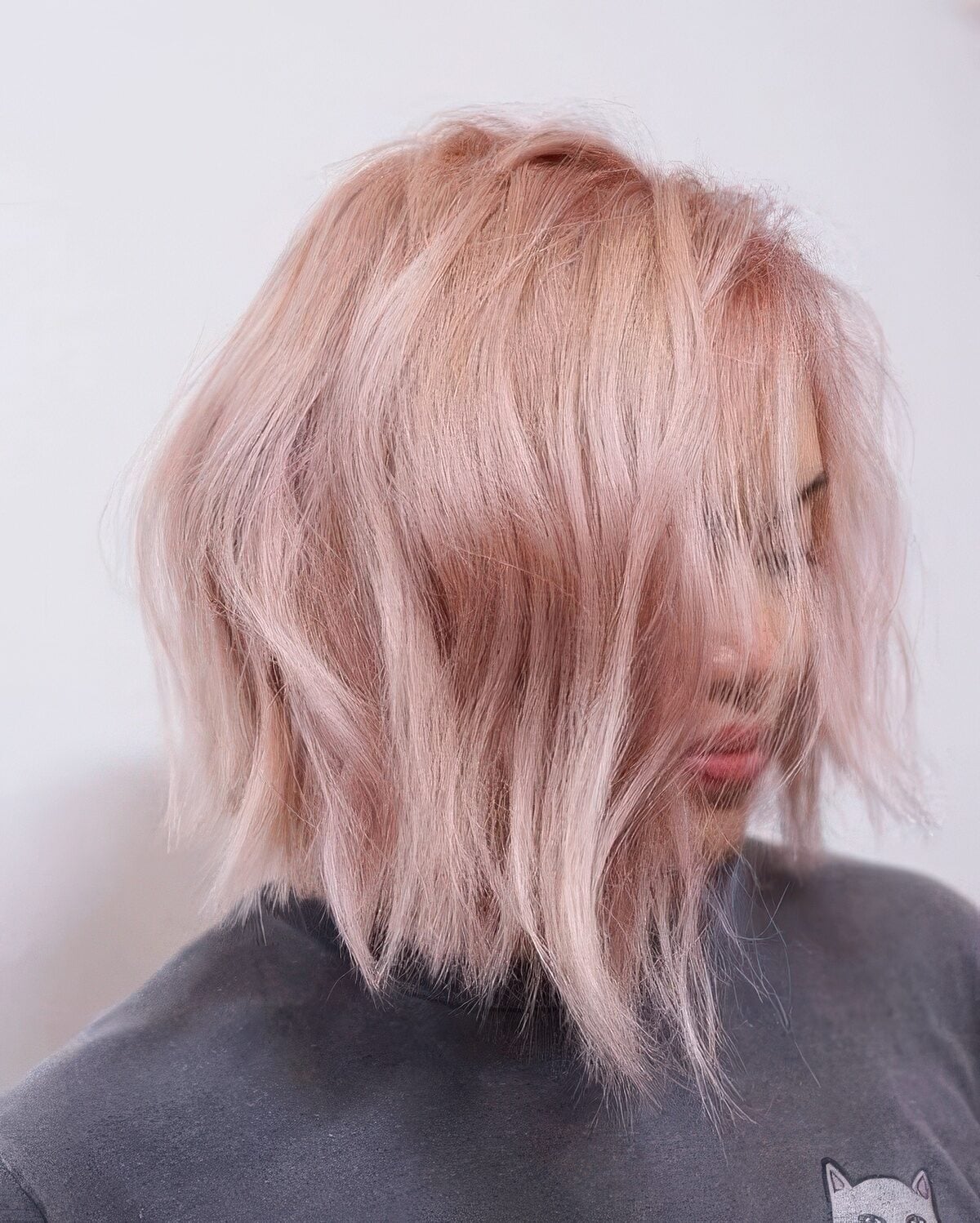 Textured Chin Length Bob With Forward Styling Textured Chin Length Bob With Forward Styling — Aesthetic Pastel Pink Hair