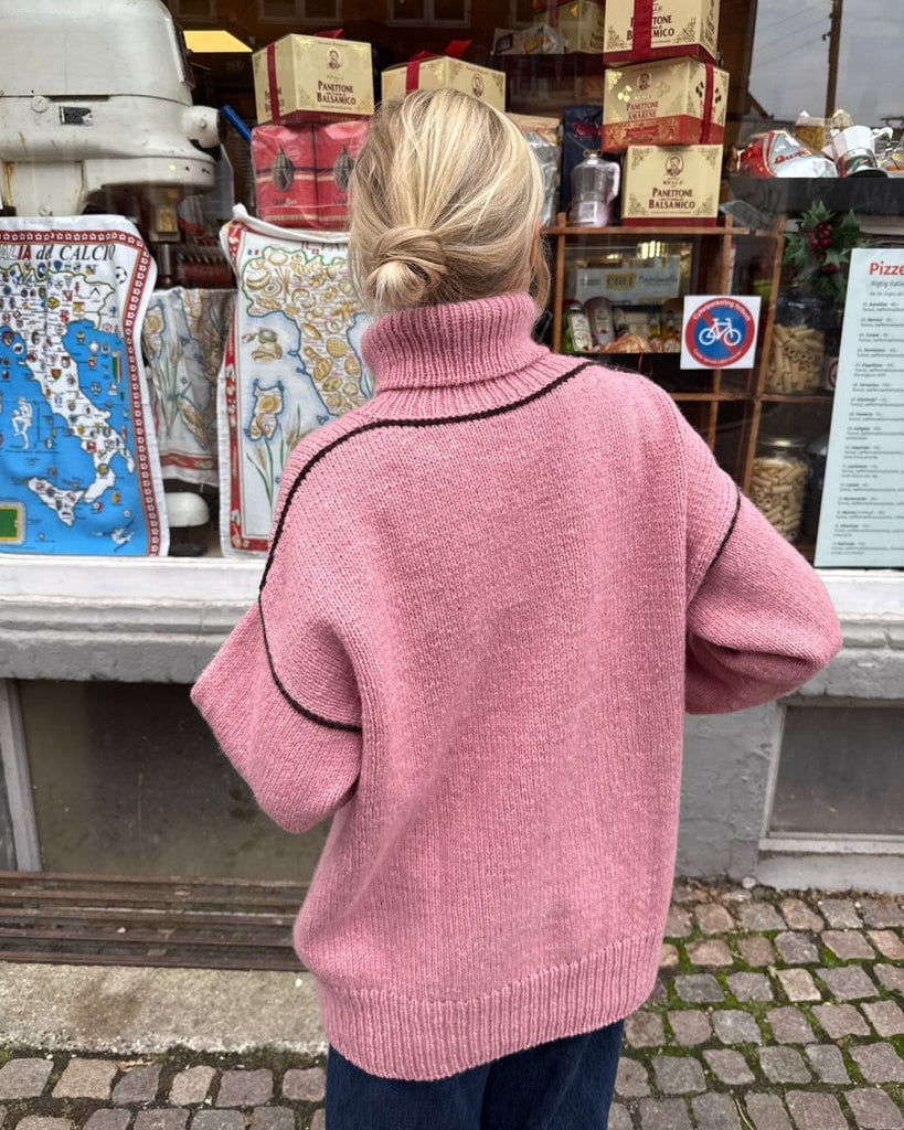 Oversized Pink Turtleneck Sweater with Black Trim — Aesthetic Pink Sweater Outfit