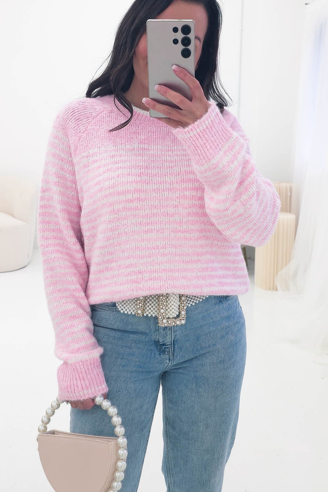 Pale Pink Cable Knit Sweater Over a Cream Turtleneck with Jeans — Aesthetic Pink Sweater Outfit