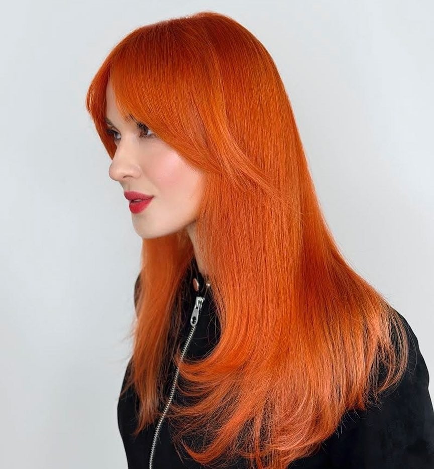 Vibrant Orange-Red Collarbone Blowout — Aesthetic Red Hair