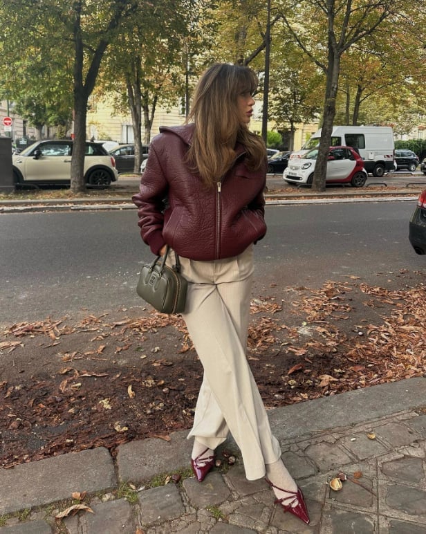 Textured Burgundy Leather Jacket With Beige Trousers — Aesthetic Red Leather Jacket Outfit