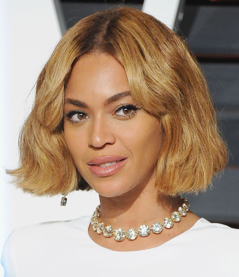 Honey Blonde Bob With Side Swept Bangs — Aesthetic Short Hair Bob