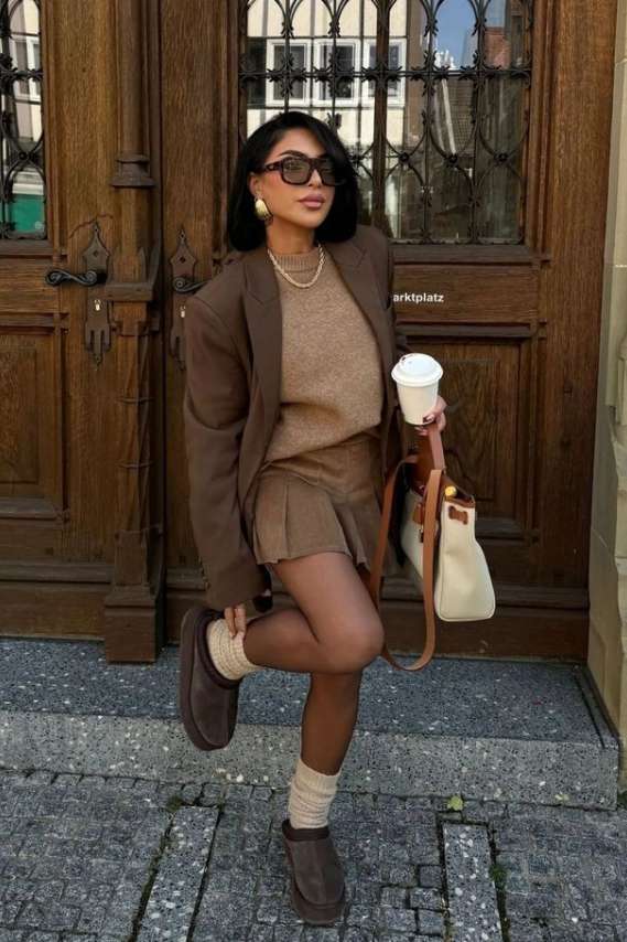 Dark Brown Clogs with Pleated Mini Skirt and Oversized Brown Blazer — Aesthetic Ugg Tasman Outfit