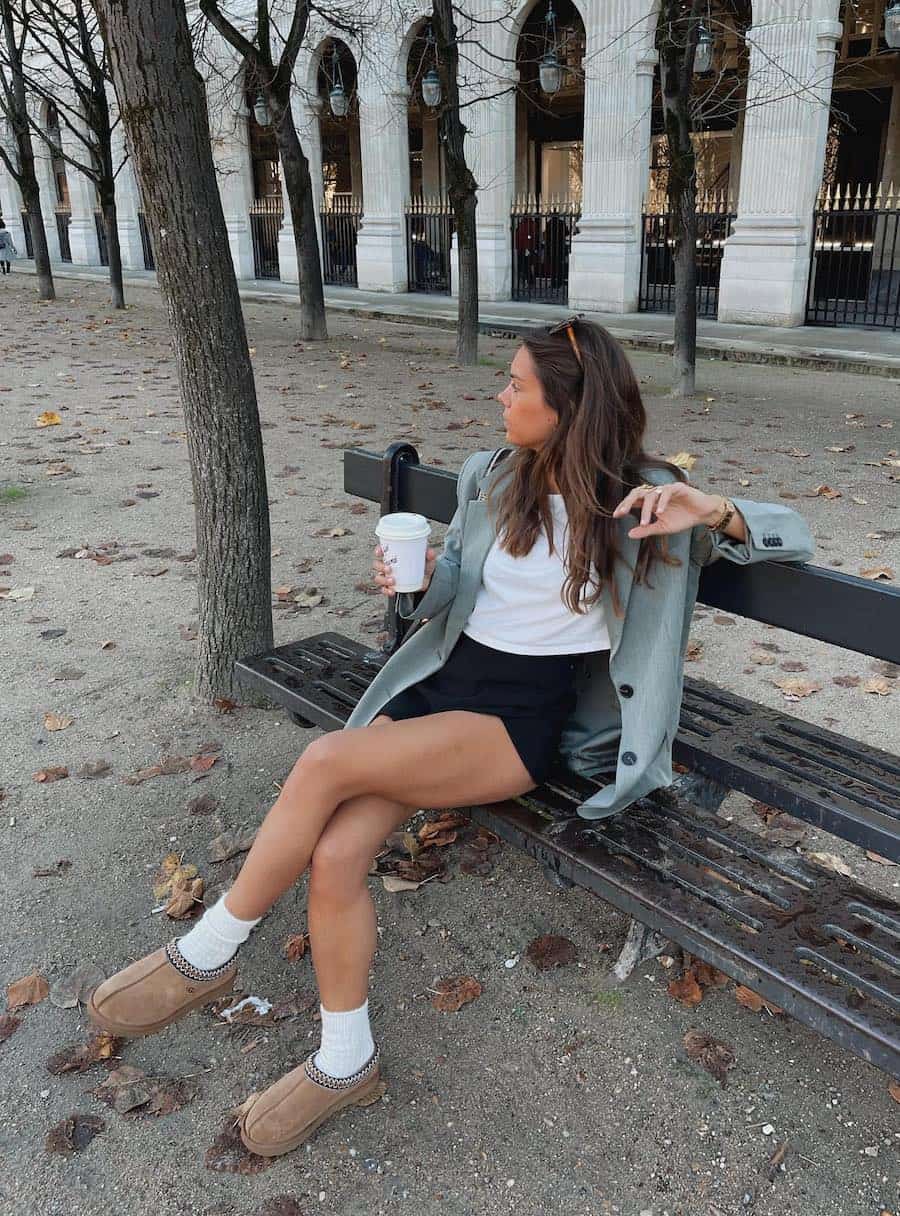 Tan Ugg Tasman Slippers with Black Shorts and Light Green Blazer — Aesthetic Ugg Tasman Outfit