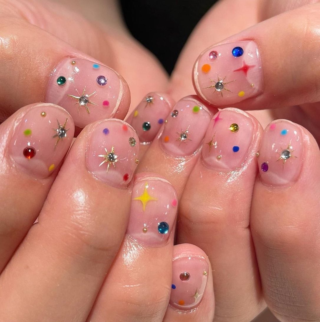 Short Oval Pink With Dots And Stars Short Oval Pink With Dots And Stars — Aesthetic University Nails