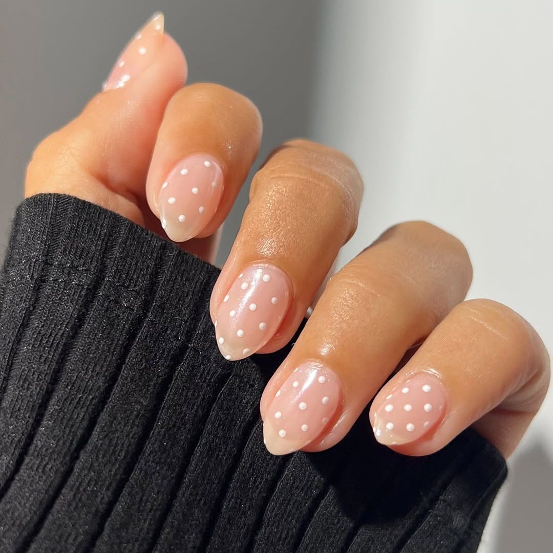 Sheer Pink Medium Oval Nails with White Polka Dots Sheer Pink Medium Oval Nails with White Polka Dots — Best Classy Nails