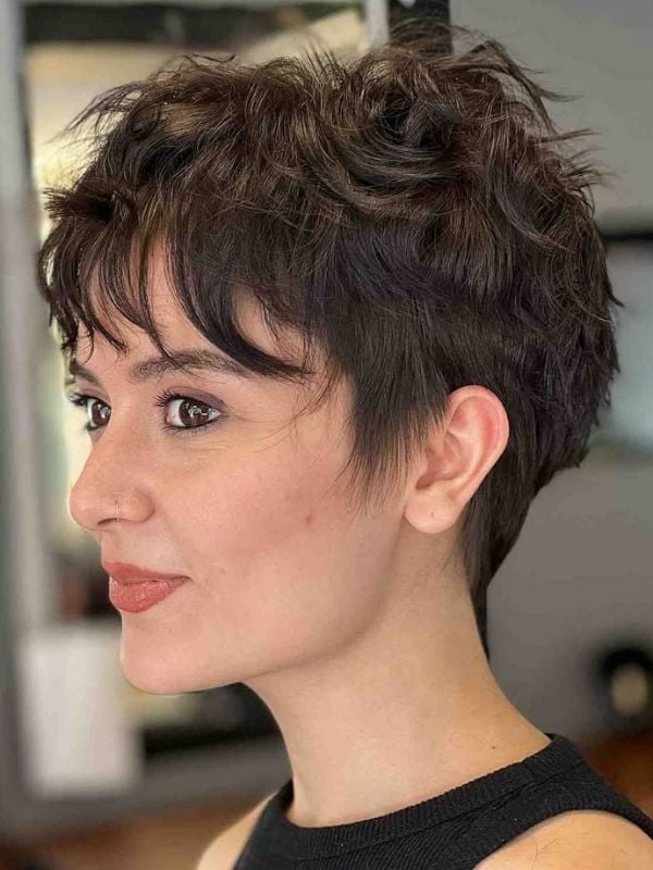 Textured Pixie With Wispy Bangs and Ear Length On Sides — Best Trendy Haircuts