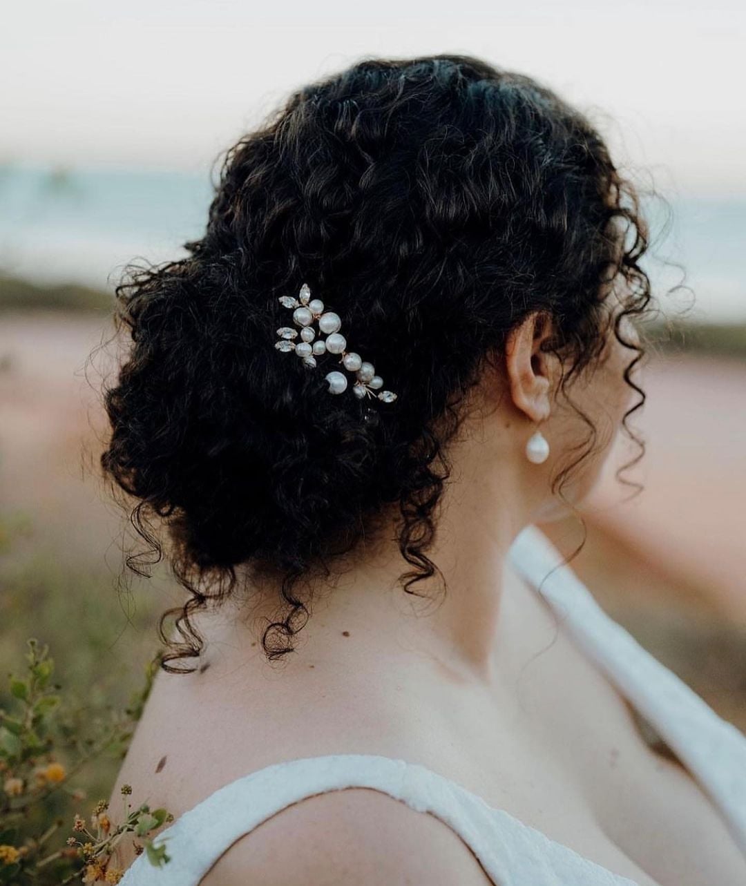 Dark Brown Curly Hair Updo With Accessory and Bun With Loose Tendrils — Classy 3c Hairstyles