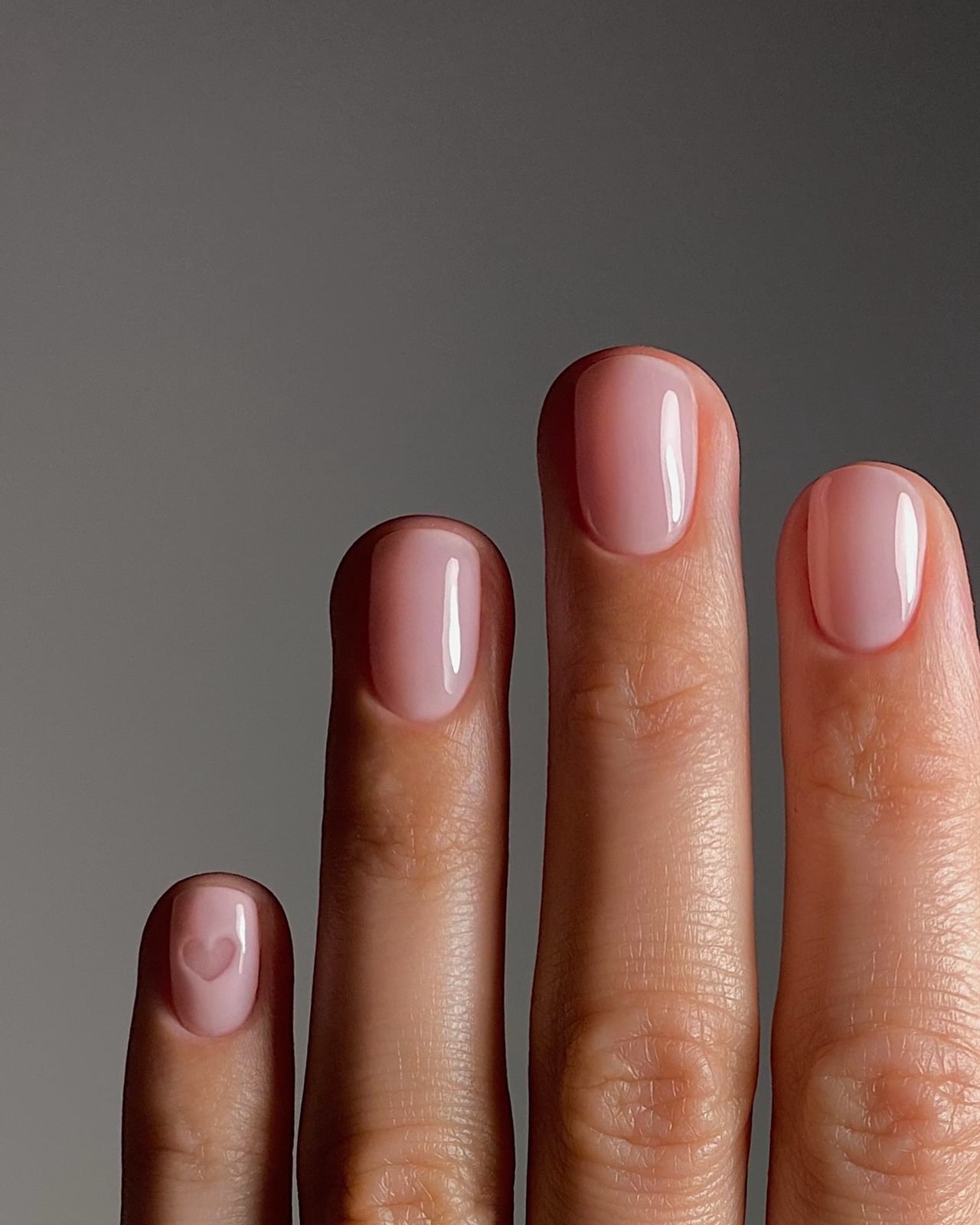 Short Almond Milky Pink Heart Accent Nails Short Almond Milky Pink Heart Accent Nails — Classy Anniversary Nails