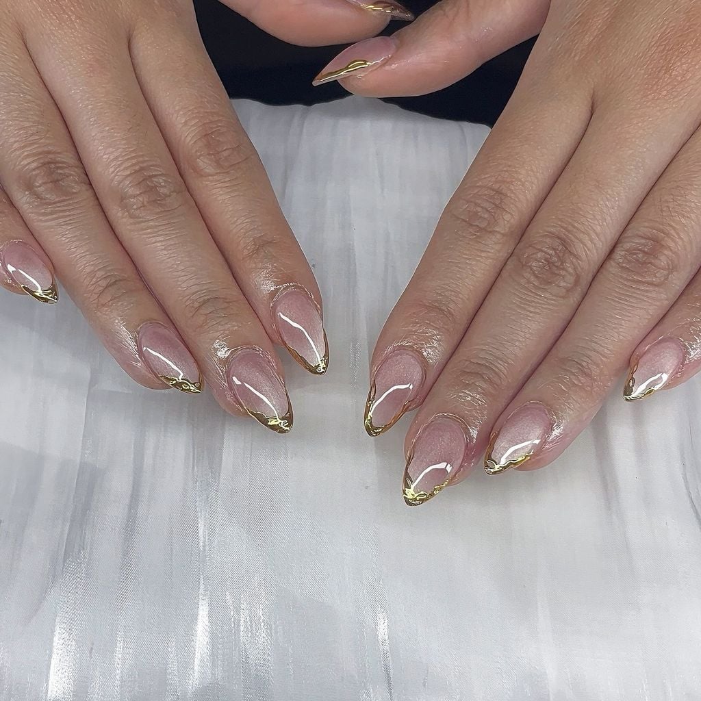 Sheer Nude Medium Almond Gold Foil French Tips Sheer Nude Medium Almond Gold Foil French Tips — Classy Anniversary Nails