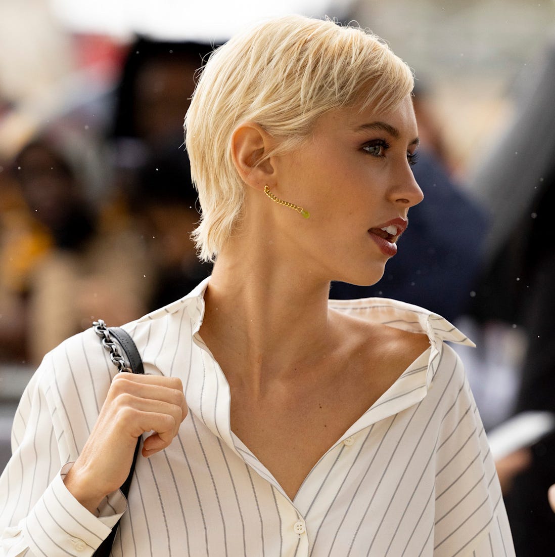 Platinum Blonde Pixie With Textured Tousled Bangs Platinum Blonde Pixie With Textured Tousled Bangs — Classy Asymmetrical Pixie