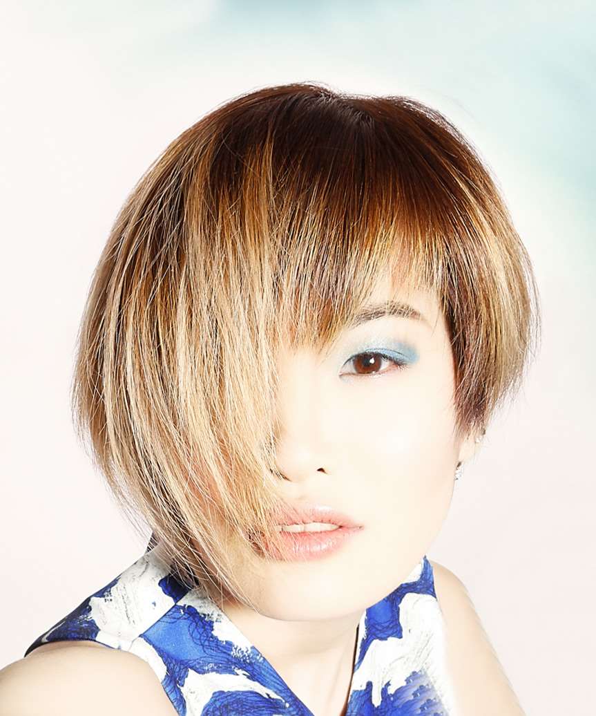 Asymmetrical Pixie Bob With Heavy Side Bangs Asymmetrical Pixie Bob With Heavy Side Bangs — Classy Asymmetrical Pixie