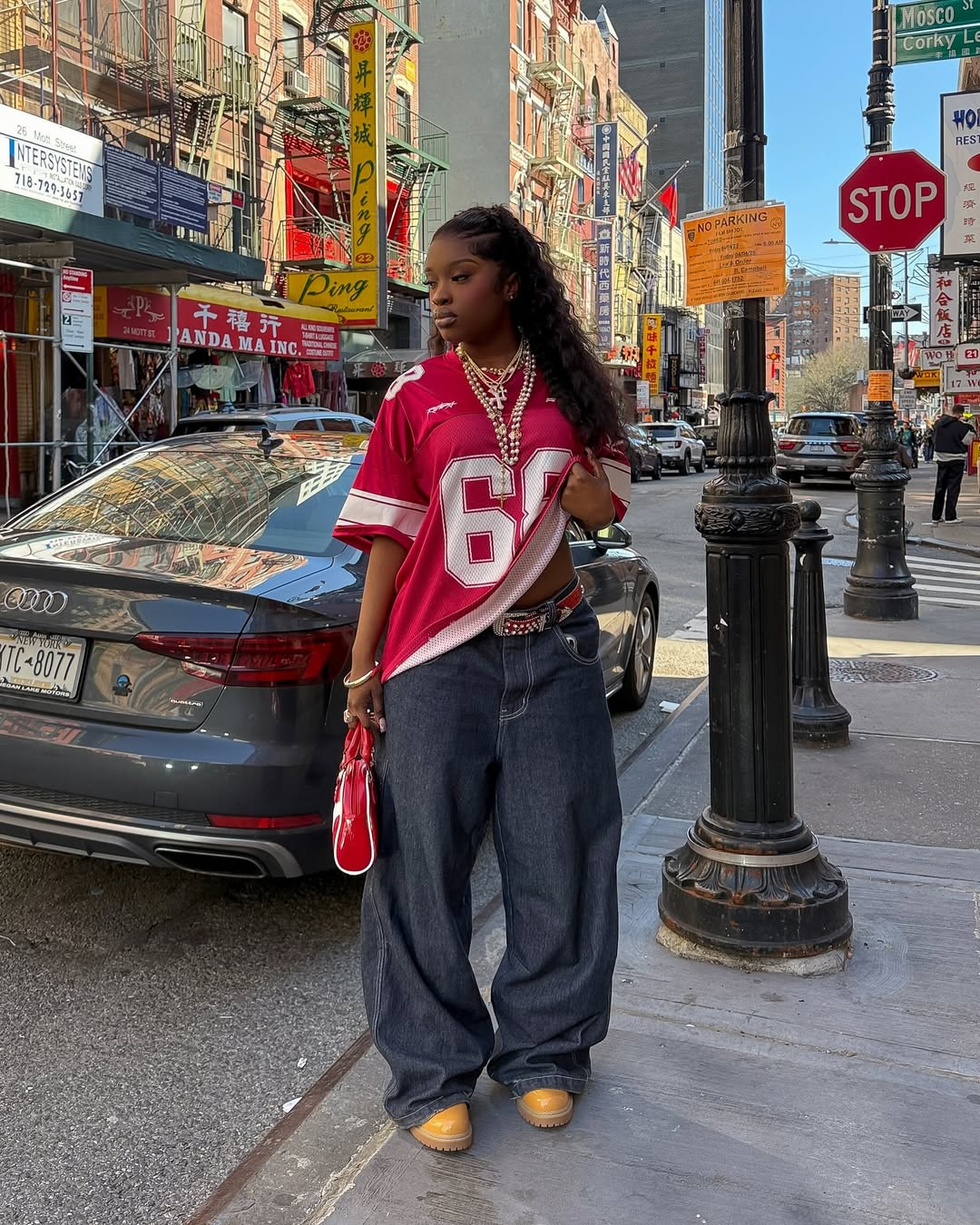 Oversized Jeans with Red and White Sports Jersey Oversized Jeans with Red and White Sports Jersey — Classy Baddie Outfits