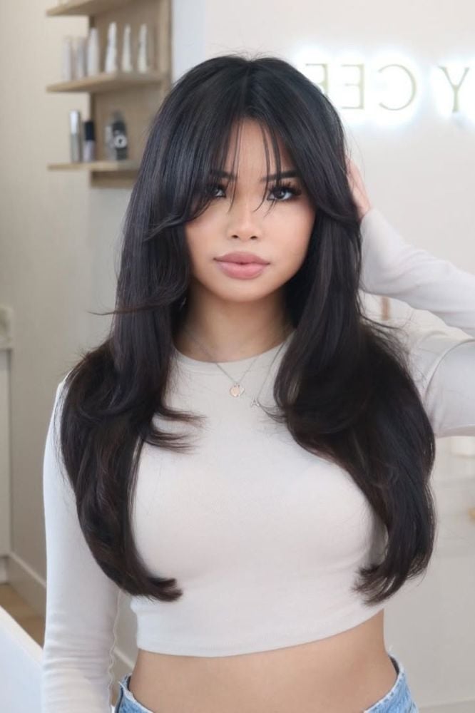 Collarbone Layers With Soft Curtain Bangs Collarbone Layers With Soft Curtain Bangs — Classy Bangs for Round Face