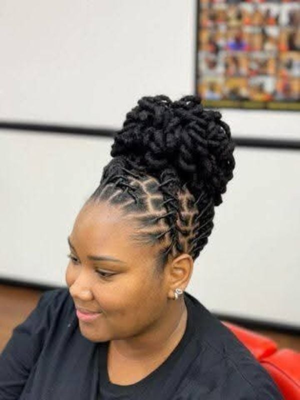 Shoulder Length High Bun With Braided Sections Shoulder Length High Bun With Braided Sections — Classy Barrel Locs