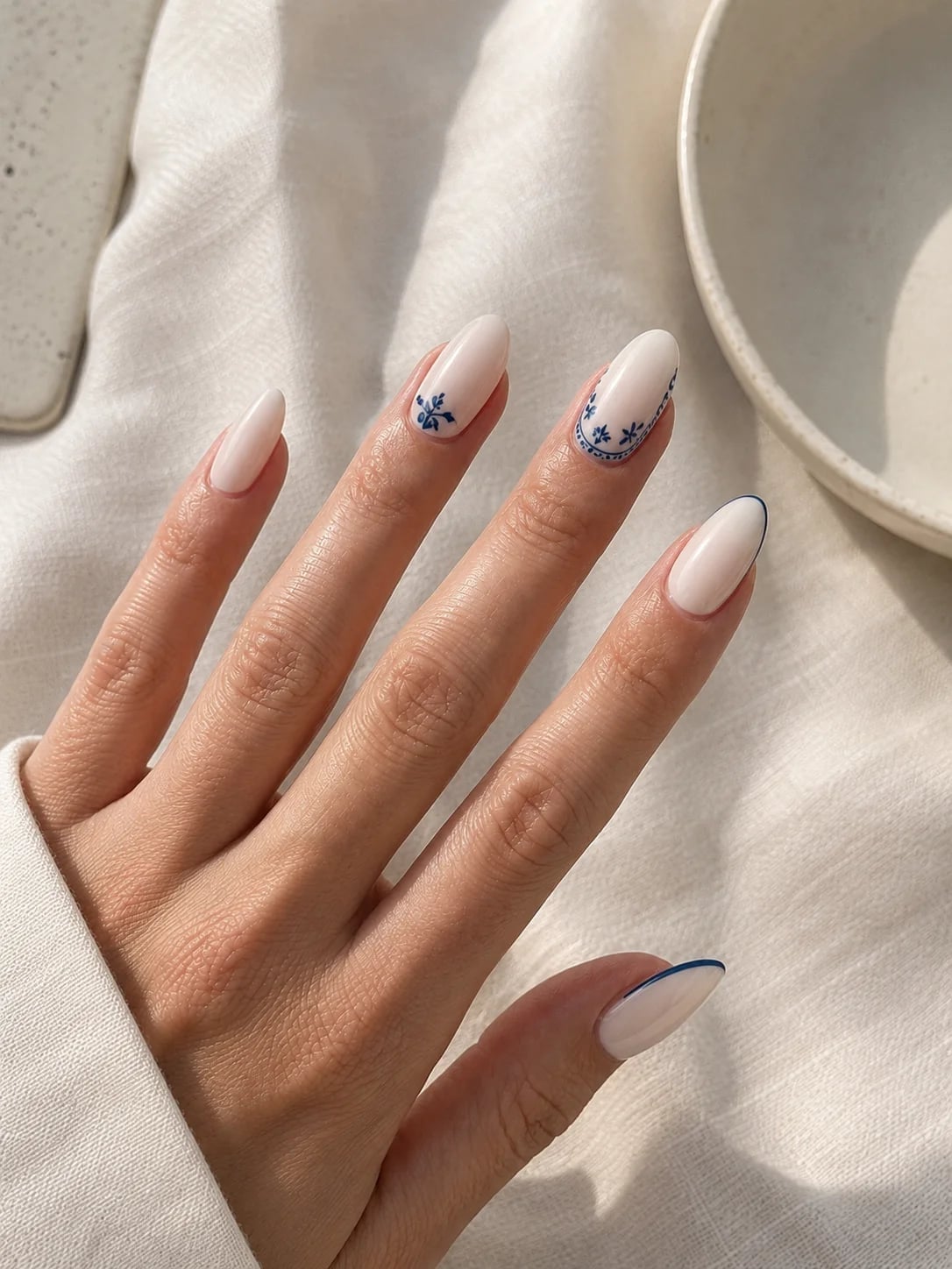 Creamy Blue Floral Pattern Almond Nails — Classy Basic Nails