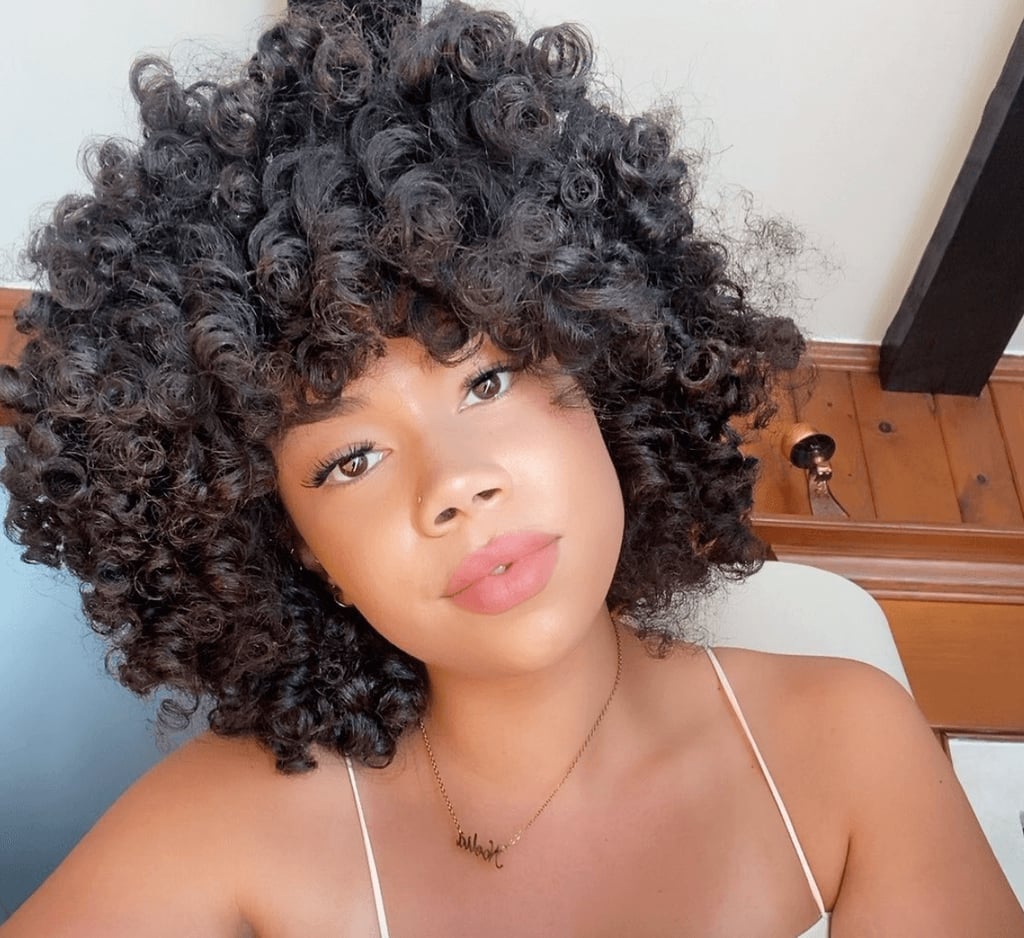 Collarbone Cut With Voluminous Curls — Classy Black Curly Hair