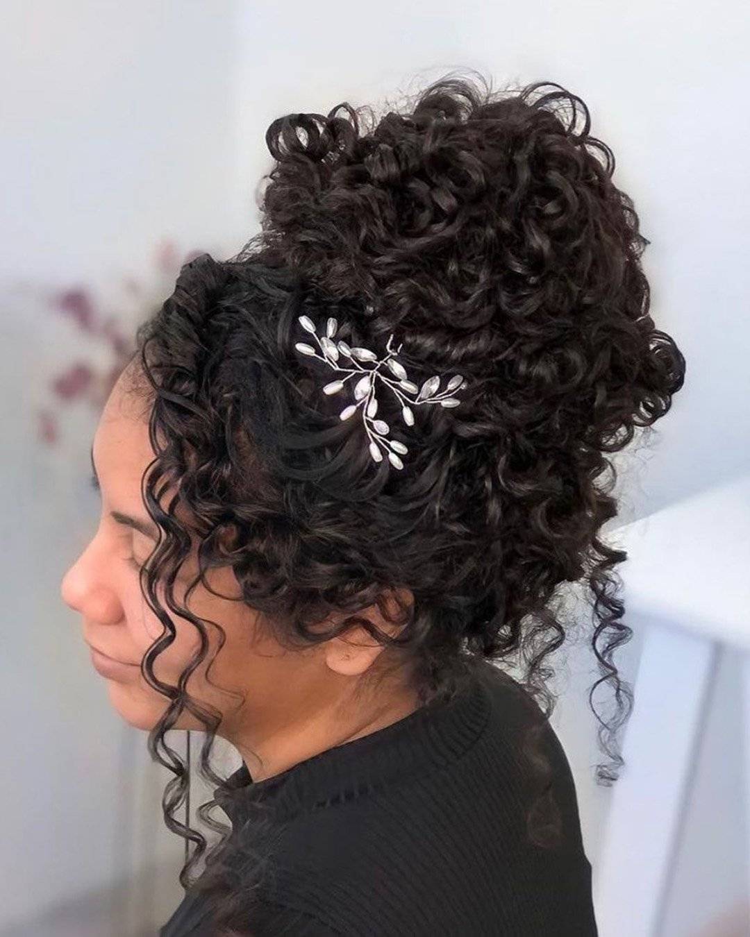 Updo With Voluminous Curls and Accessory — Classy Black Curly Hair