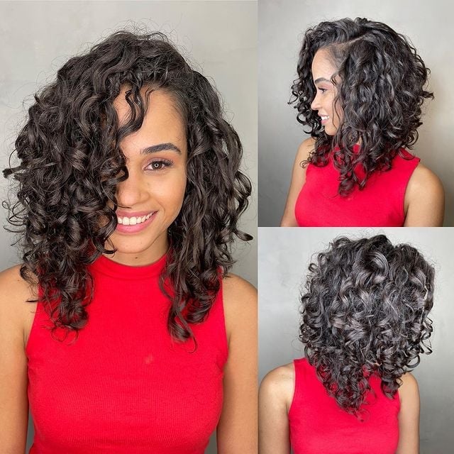 Angled Bob With Highlights and Bangs — Classy Black Curly Hair