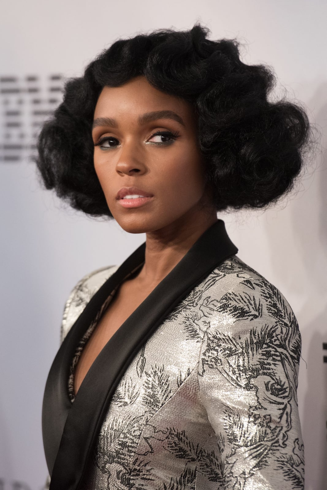 Voluminous Chin-Length Bob — Classy Black Curly Hair