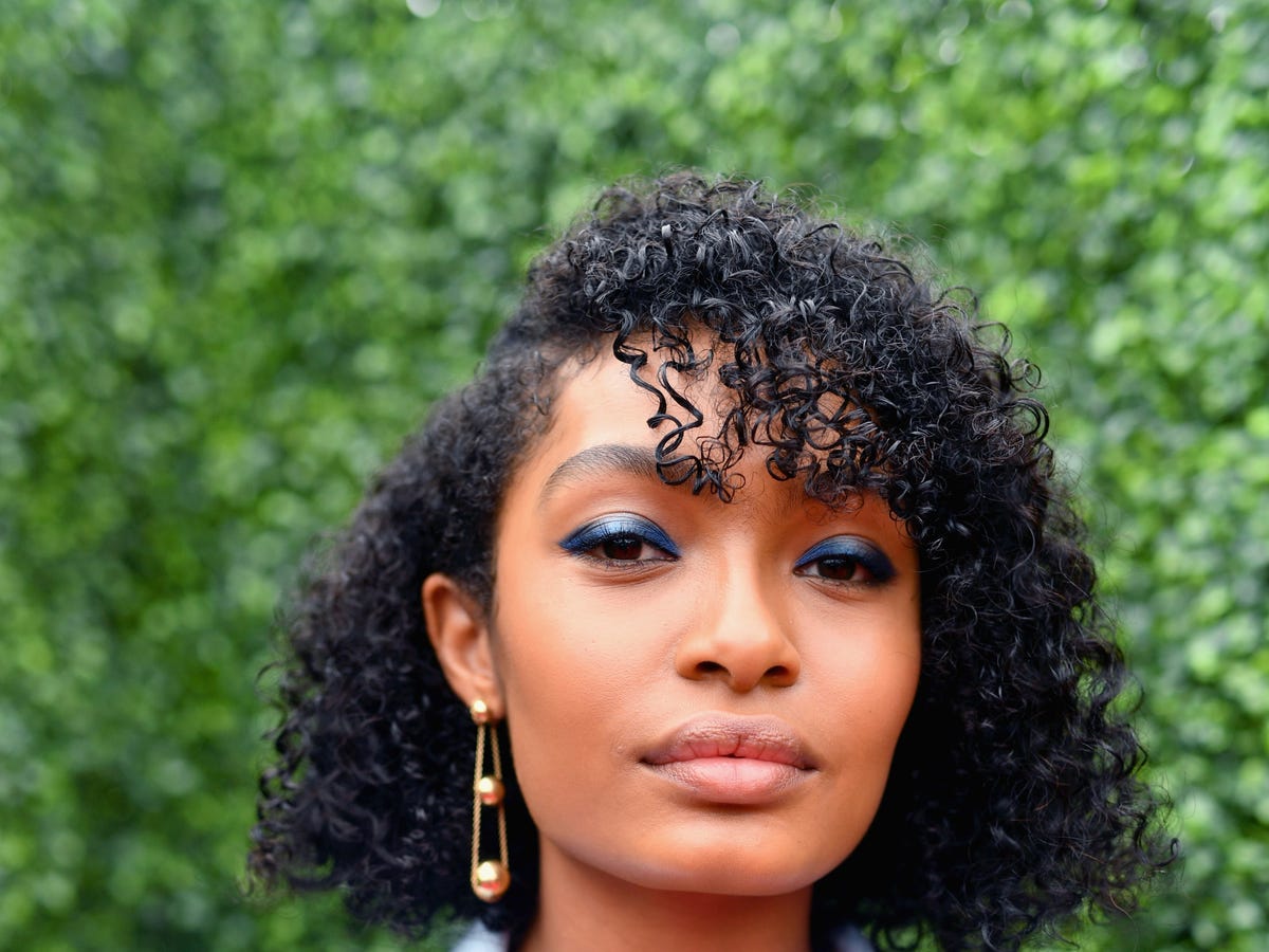 Short Layered Cut With Side-Swept Bangs — Classy Black Curly Hair