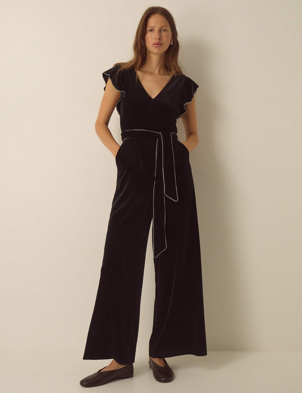 Velvet Jumpsuit With Flutter Sleeves and Embellished Belt — Classy Black Jumpsuit Outfit