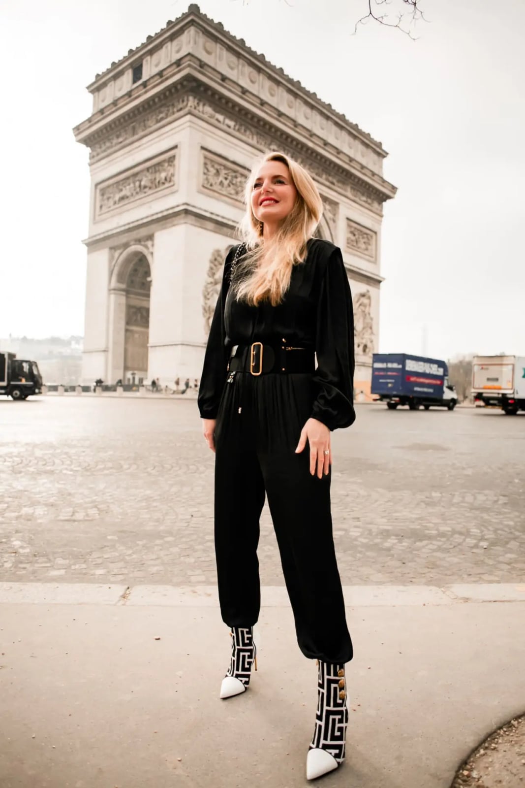Velvet Jumpsuit With Cinched Waist and Patterned Boots — Classy Black Jumpsuit Outfit