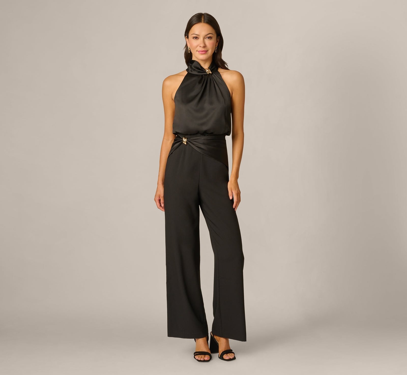 Halter Neck Jumpsuit With Gold Neckline Accent, Close-Up Take — Classy Black Jumpsuit Outfit