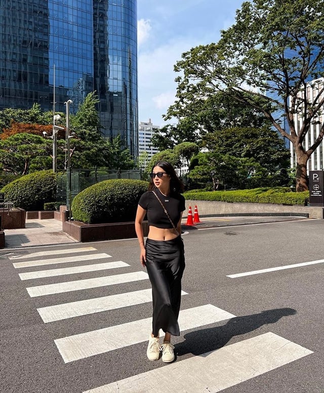 Flowing Black Satin Midi Skirt With Crop Top And Sneakers — Classy Black Midi Skirt Outfit