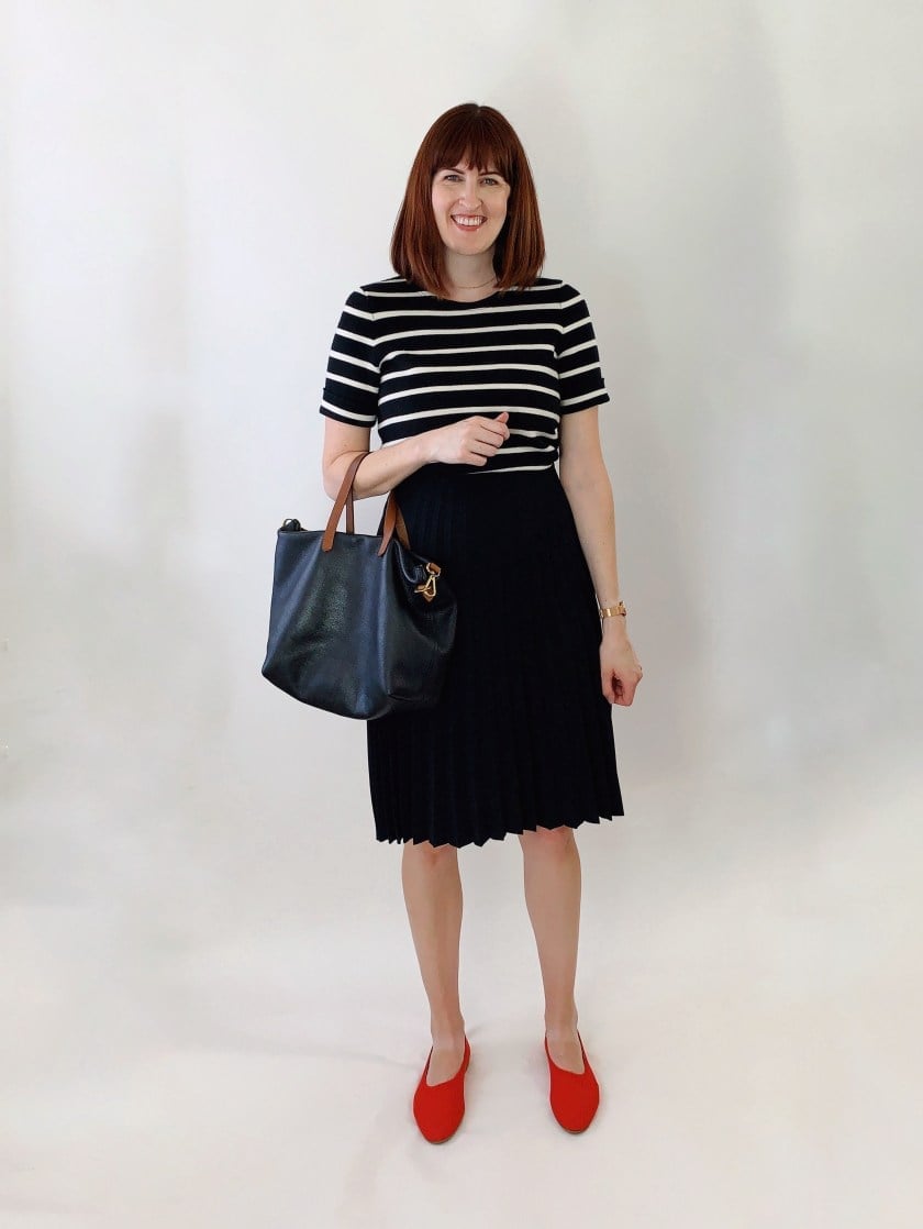 Black Pleated Midi Skirt with Striped Top and Red Flats, Close-Up Take — Classy Black Skirt Outfit