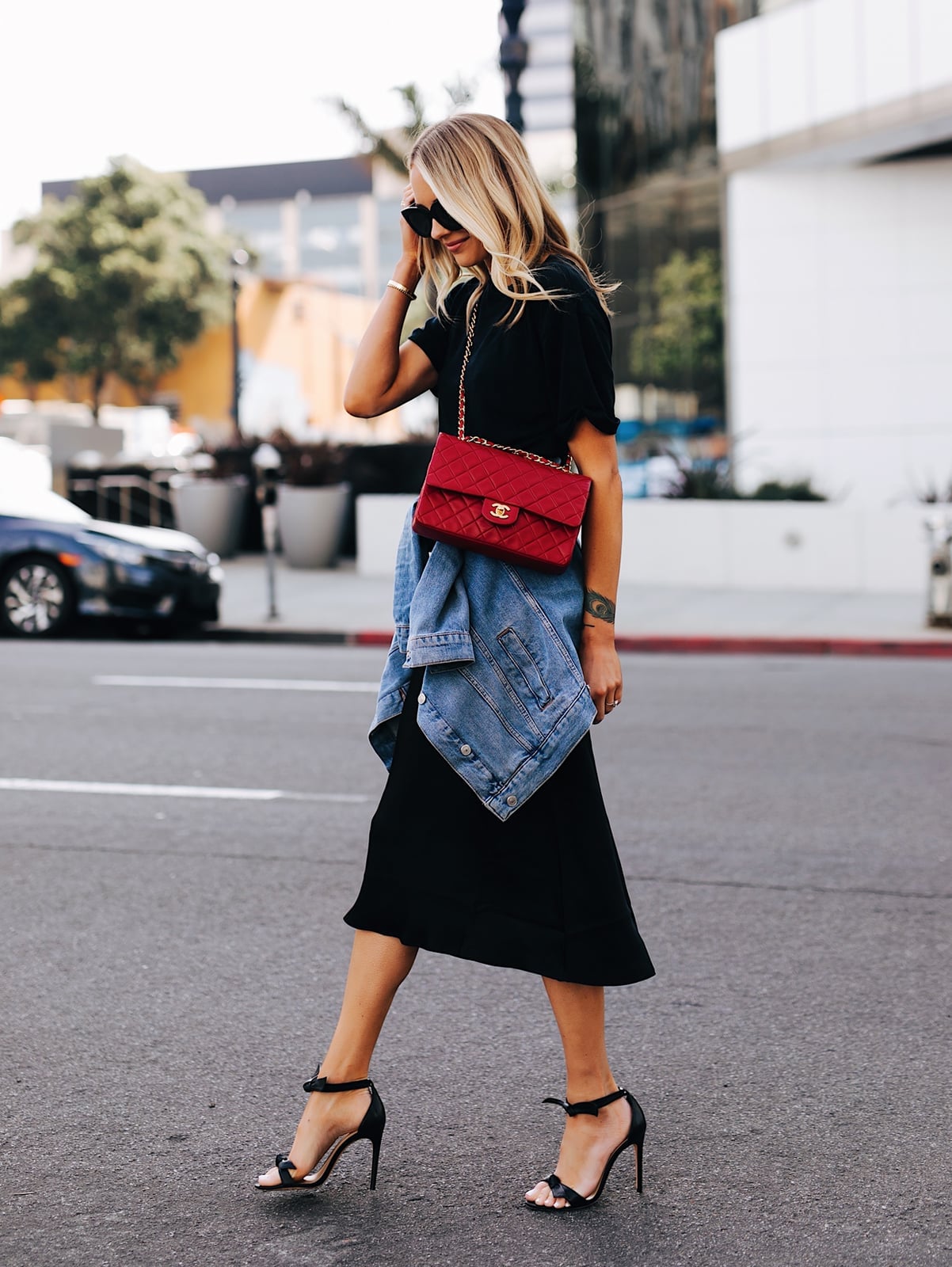 Black Midi Skirt with Denim Jacket and Red Handbag — Classy Black Skirt Outfit
